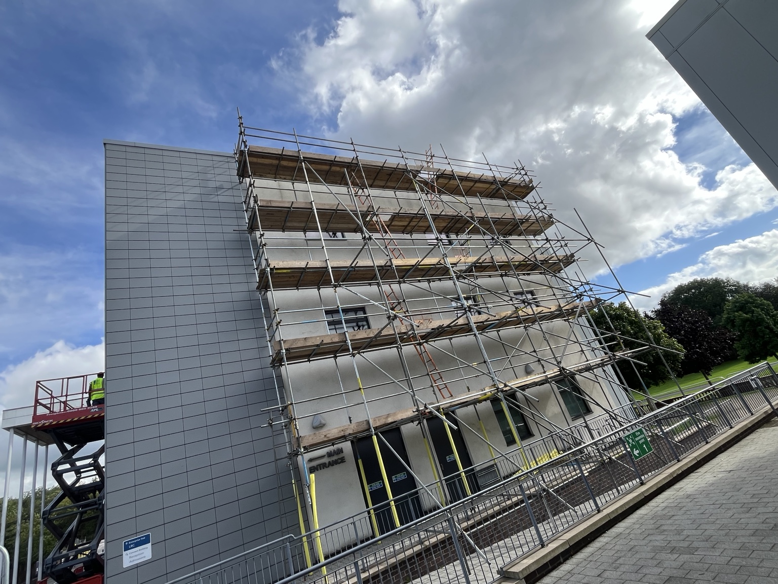 Wide view of scaffold access across the college building